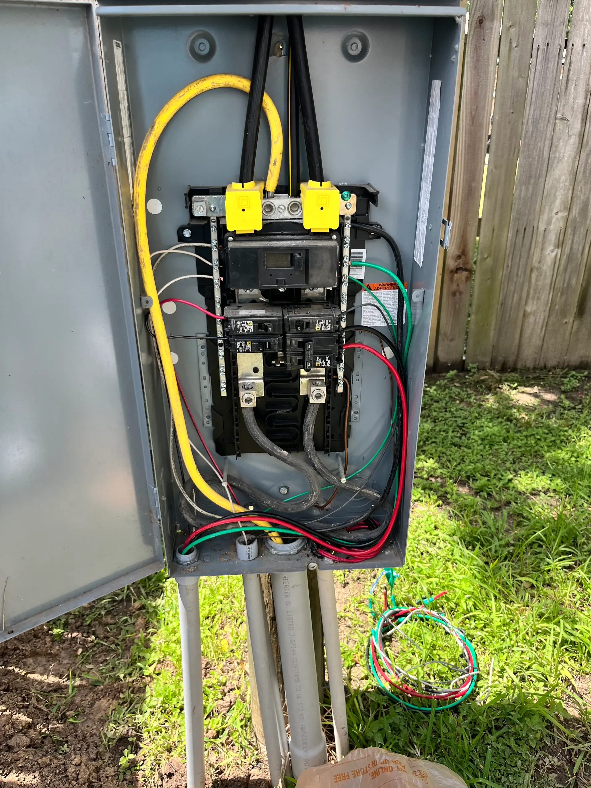 Tesla EV charger dedicated circuit wired into an electrical panel by Electric Yahweh in Houston